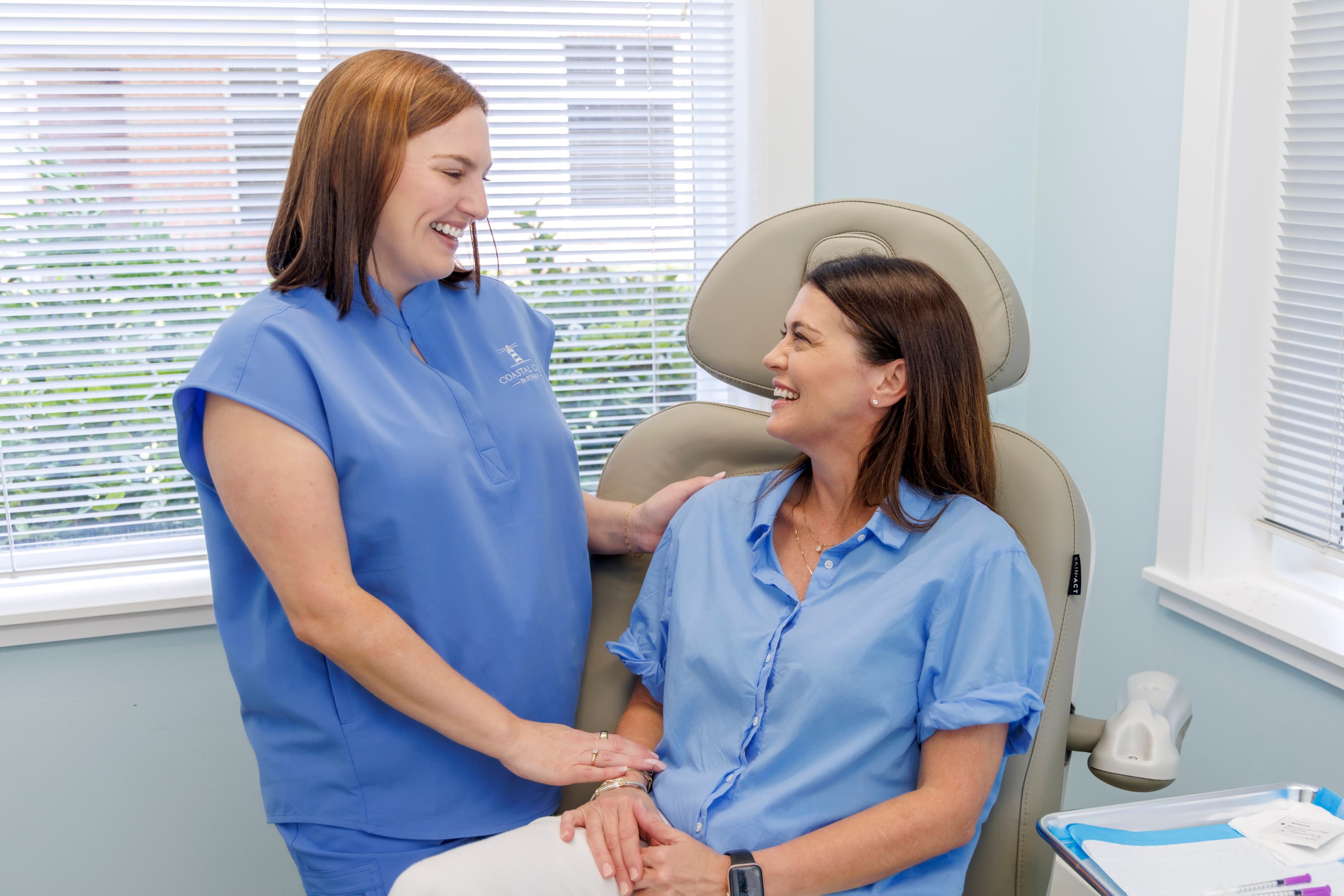Ansley Powell with a patient at Coastal Care Vitality